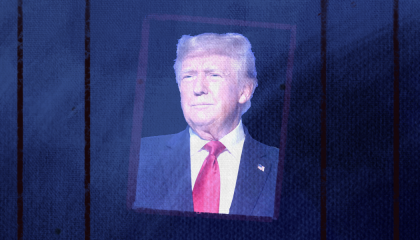 A slightly askew portrait of Donald Trump with thin prison bars on either side, against a navy blue-to-black background 